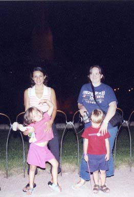 AlinaAndMihaelaBuckinghamFountainNightWithKidsBJuly2003