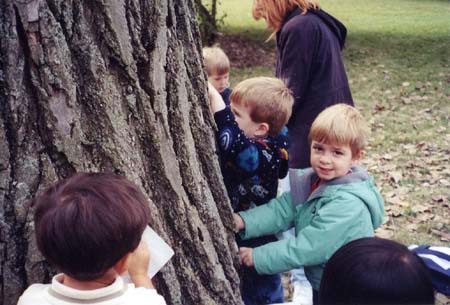 AvynTouchingTreeAtMortonArboretum2003