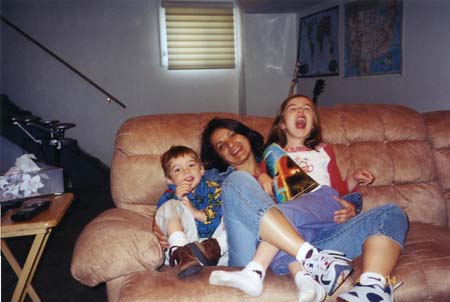 AlinaWithKidsOnCouch_200403